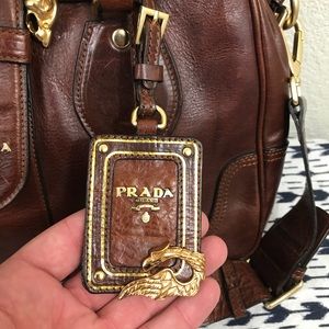 prada dragon buckle bag